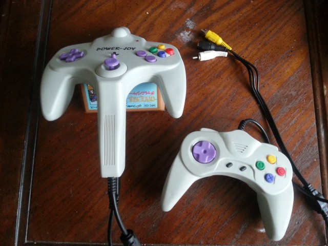 Wow, it's been a long time since I've had an actual image on this blog, right? Anyway, the top of the N64-ish controller actually has a pointy bit that functions as the Zapper. The trigger is where the N64's Z button would be. It doesn't work well.